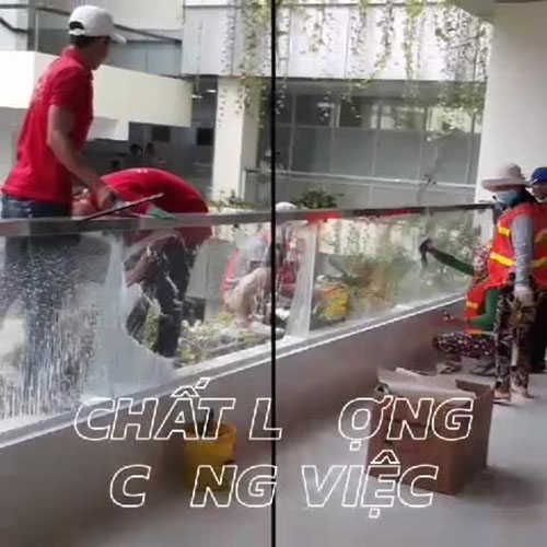 Dịch vụ lau kính tòa nhà