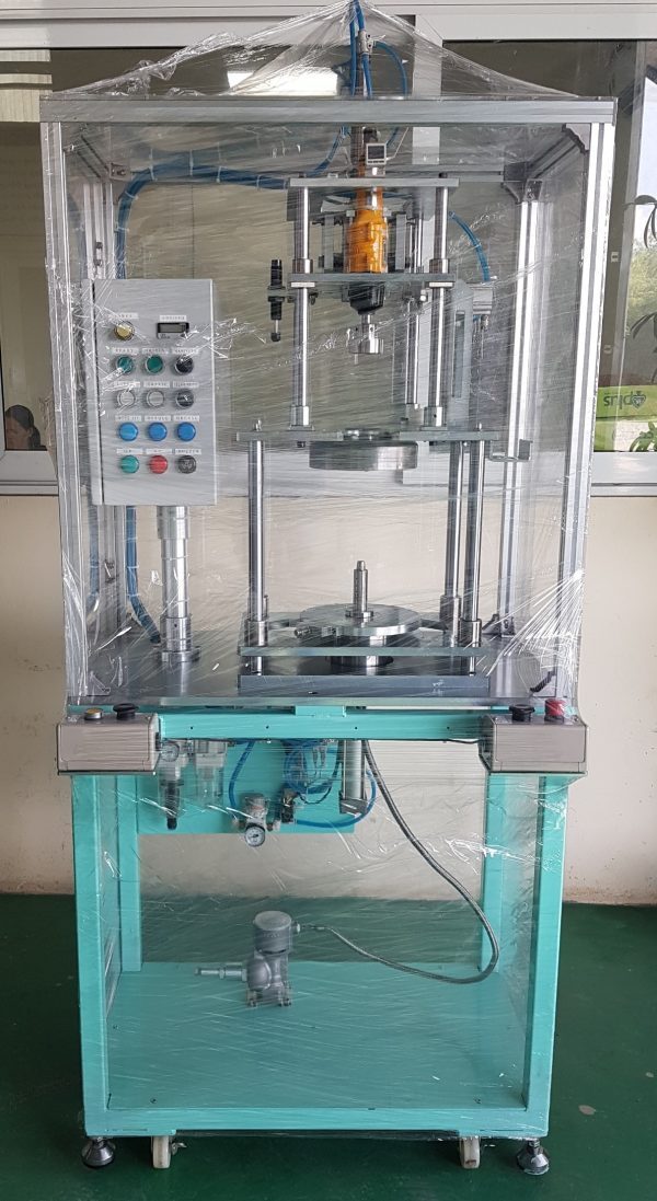 Máy siết nút